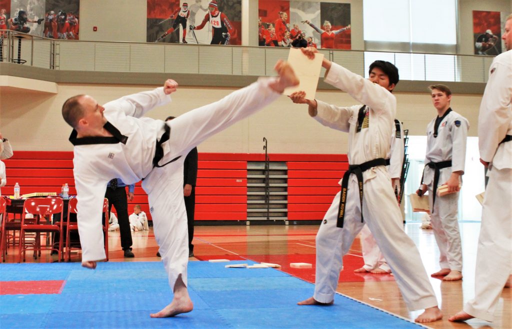 Martial arts competitors demonstrate forms and weapons at Detroit Lakes